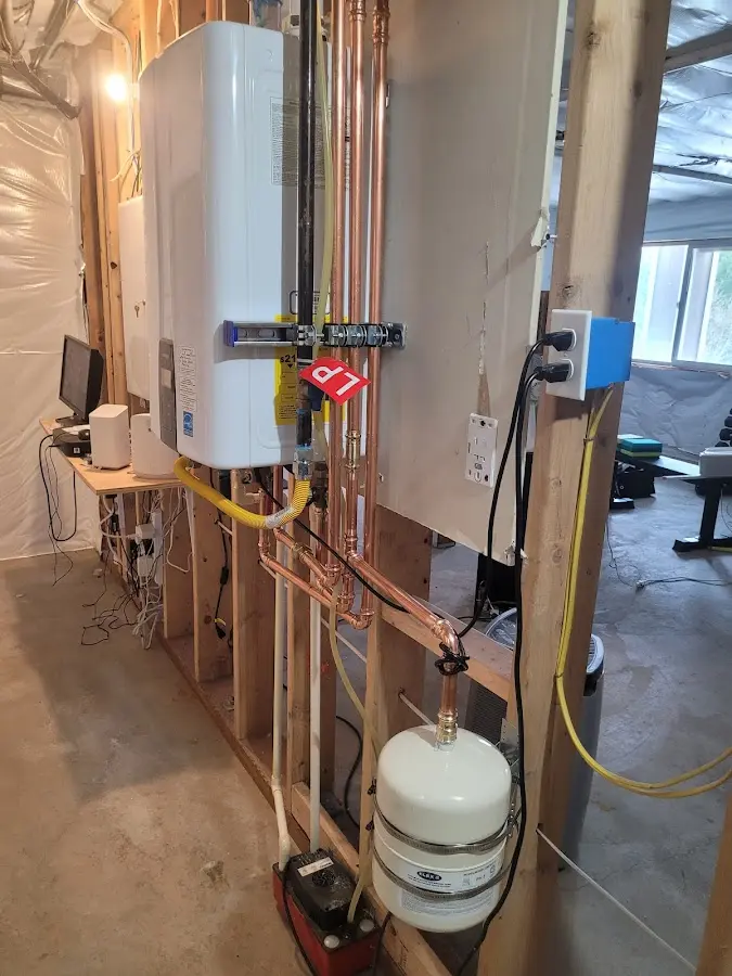 Licensed plumber repairing a kitchen sink in Moscow